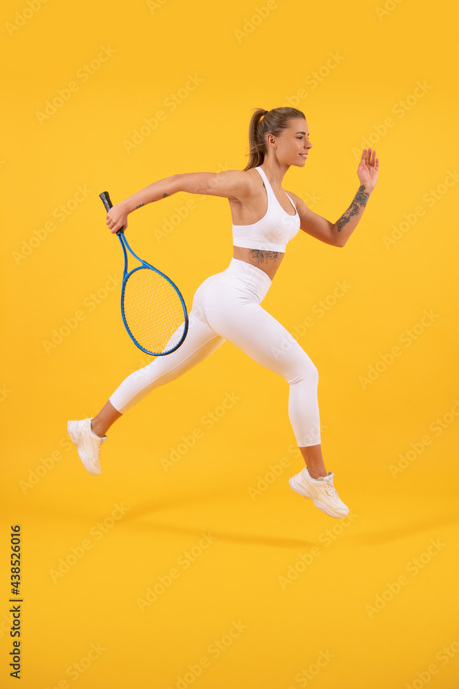 dedicated to fitness. tennis or badminton player training. healthy and active lifestyle.