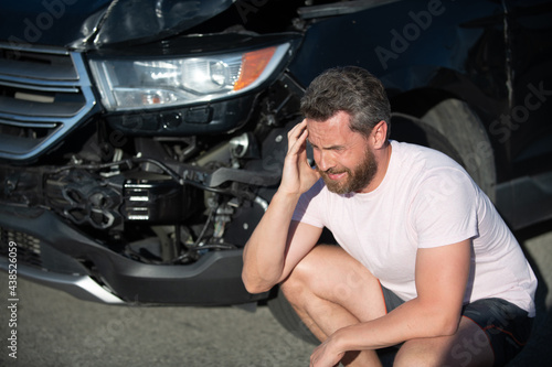 man with auto broken on road. car insurance. automobile crash. vehicle collision.
