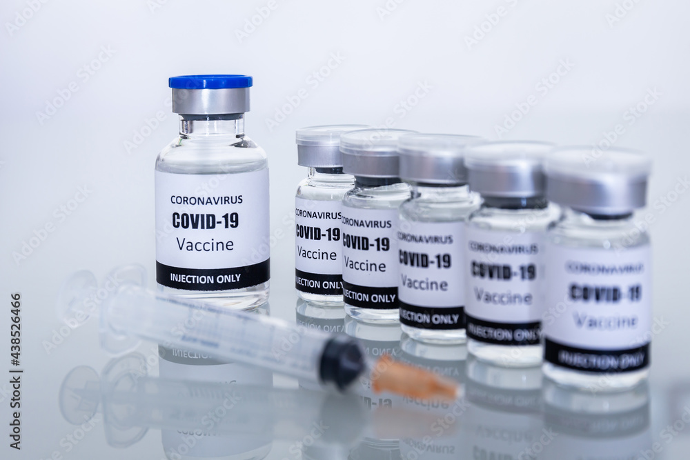 Many Vaccine bottles and syringes for preventing coronavirus or covid-19. Select focus Many Vaccine bottles and syringes for preventing coronavirus or covid-19. Select focus