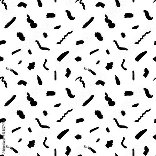 Geometric vector seamless pattern in Memphis style. Grunge brush stroke, rough dots, dashes and lines. Hand drawn organic ink illustration. Hipster black paint geometric background. 