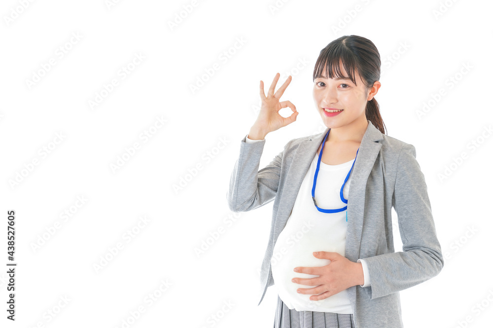 OKサインをする妊娠中のビジネスウーマン OKサインをする妊娠中のビジネスウーマン