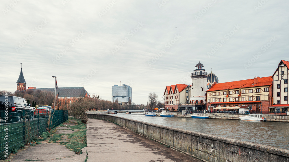 Fish Village, House of Soviets and the Cathedral on the banks of the river Pregolya Fish Village, House of Soviets and the Cathedral on the banks of the river Pregolya
