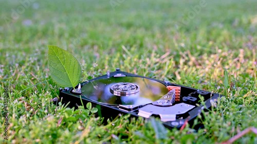 View on a HDD with a leaf representing the Chia cyrptocurrency mining.