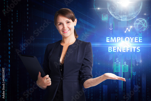 Business, Technology, Internet and network concept. Young businessman working on a virtual screen of the future and sees the inscription: Employee benefits