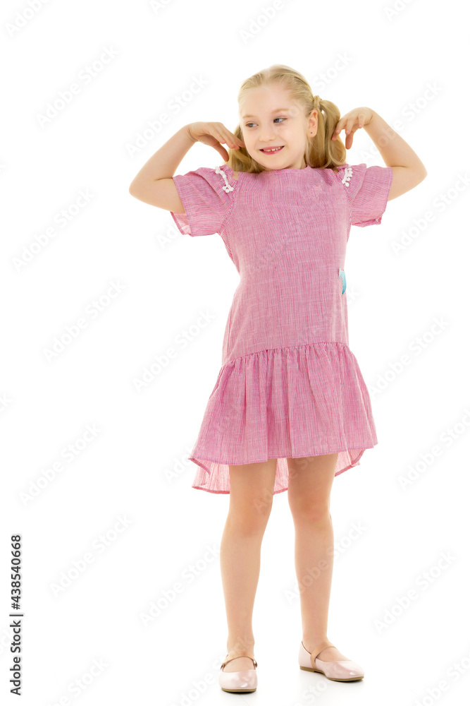 The little girl spread her arms to the sides, children's emotions. The little girl spread her arms to the sides, children's emotions.