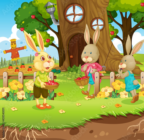 Outdoor scene with happy rabbit family in the garden