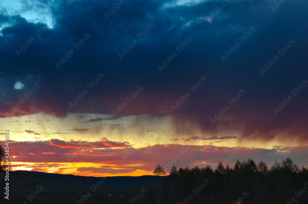 Sunset above road and forest warm evening Sunset above road and forest warm evening