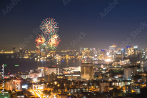 The aerial view of colorful fireworks with colorful building, International fireworks at Pattaya International Fireworks Festival 2019 in Pattaya,Thailand.