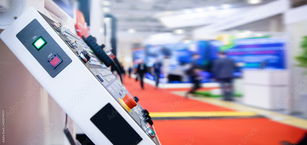 Obraz premium Control panel CNC metal milling working with industry blur background copy space