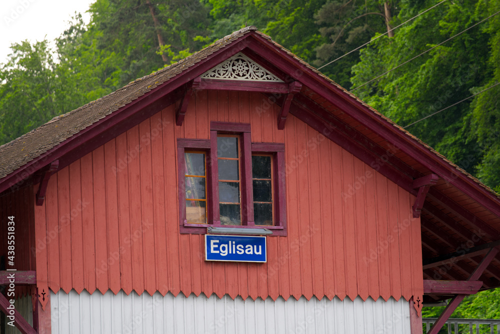 Old red wooden warehouse at railway station of Eglisau, canton Zurich, Switzerland. Photo taken June 9th, 2021, Eglisau, Switzerland.