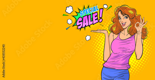 smiling woman okay gesture presenting something