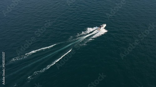 Wallpaper Mural White large yacht at high speed in the sun. Aerial view. People on the boat	 Torontodigital.ca