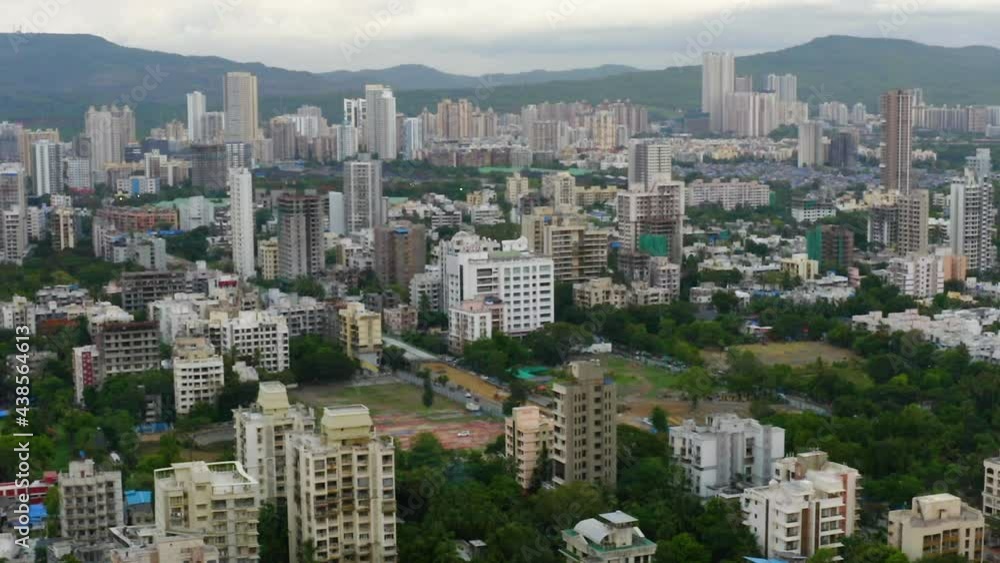 Aerial view of buildings in the East suburbs of North Mumbai, in cloudy India - circling, drone shot Aerial view of buildings in the East suburbs of North Mumbai, in cloudy India - circling, drone shot