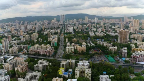 Aerial drone view overlooking the East suburbs of North Mumbai, cloudy India photo