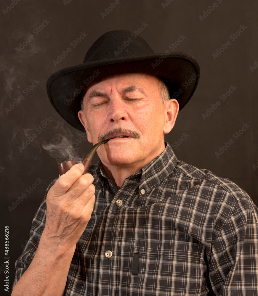 Cowboy in hat with Pipe