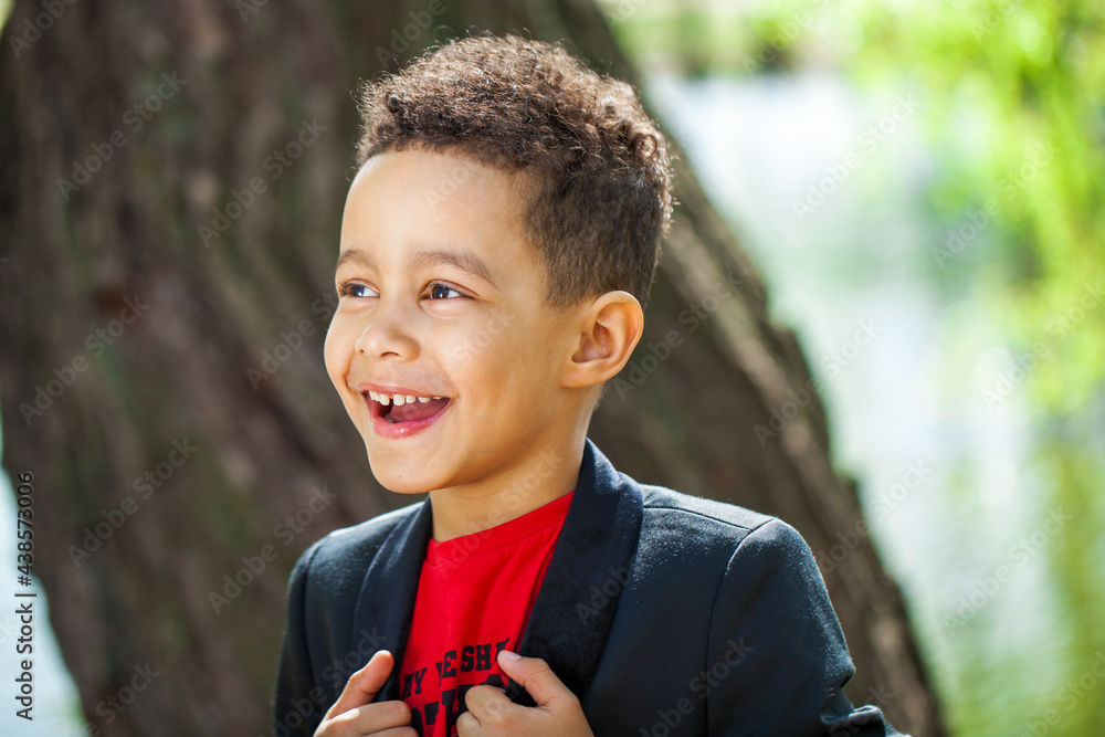 Portrait of a little boy in a summer park Portrait of a little boy in a summer park