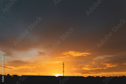 sunset and radio pole structure