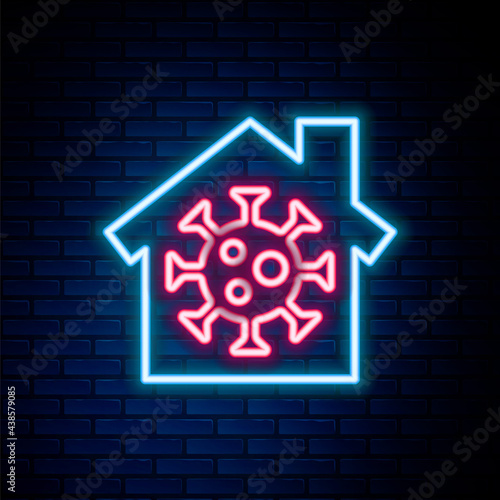 Glowing neon line Stay home icon isolated on brick wall background. Corona virus 2019-nCoV. Colorful outline concept. Vector