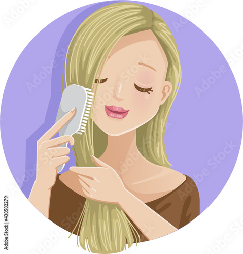 Woman brushing her hair with a comb