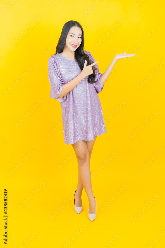 Portrait beautiful young asian woman smile with action Portrait beautiful young asian woman smile with action