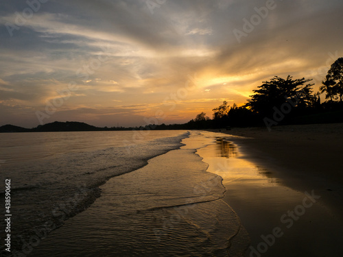 evening sandy beach golden sunlight