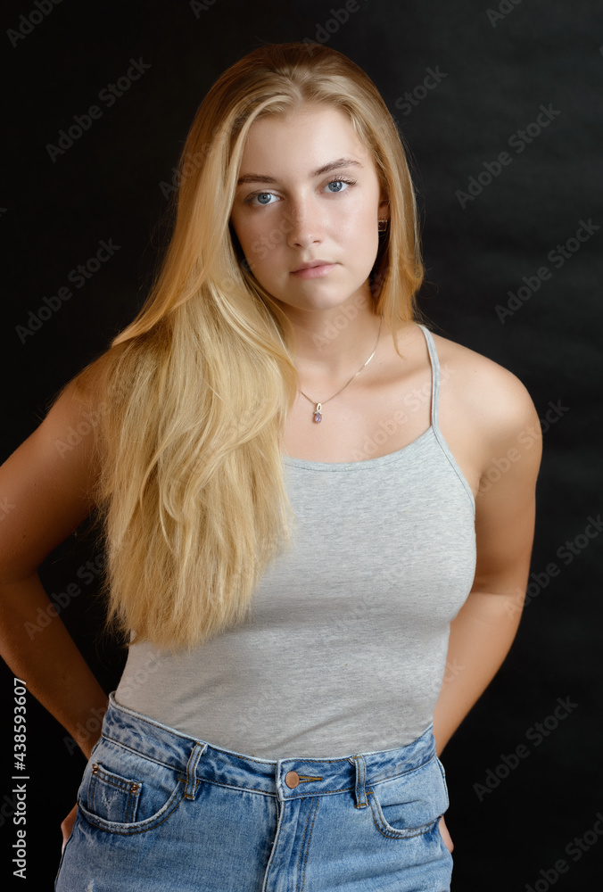 Studio portrait of beautiful sensual woman with blue eyes. Studio portrait of beautiful sensual woman with blue eyes.
