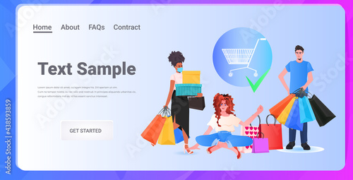 mix race people with colorful purchases shopping concept copy space horizontal