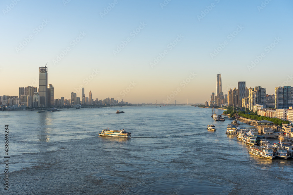 Fototapeta premium Wuhan skyline and Yangtze river with supertall skyscraper under construction in Wuhan Hubei China.