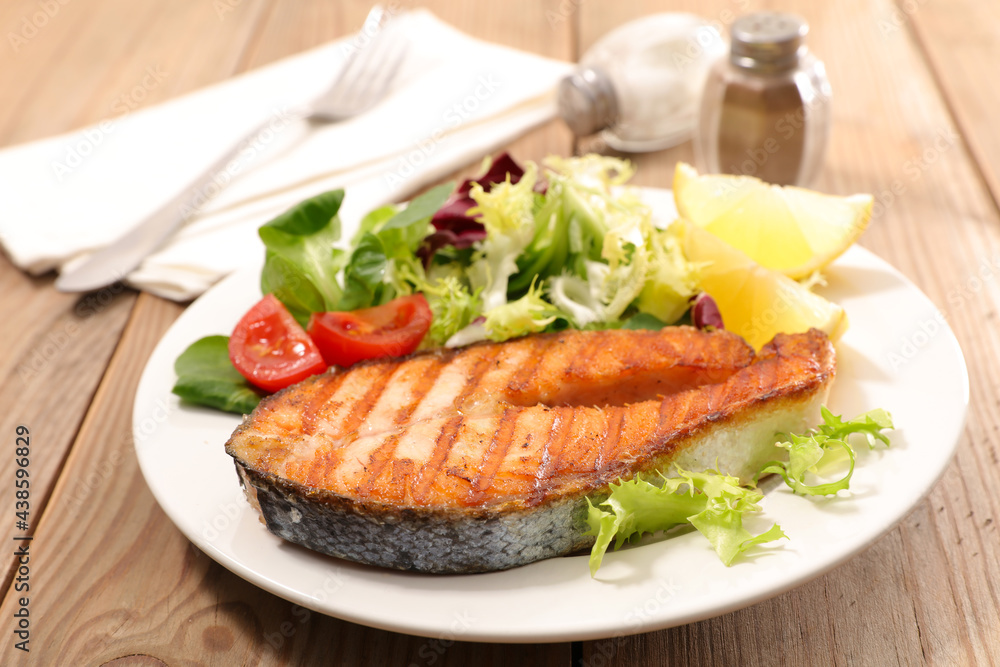 grilled salmon steak with lettuce
