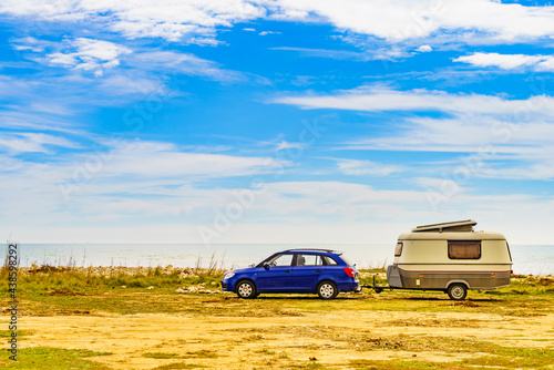 Caravan trailer camping on coast, Spain.