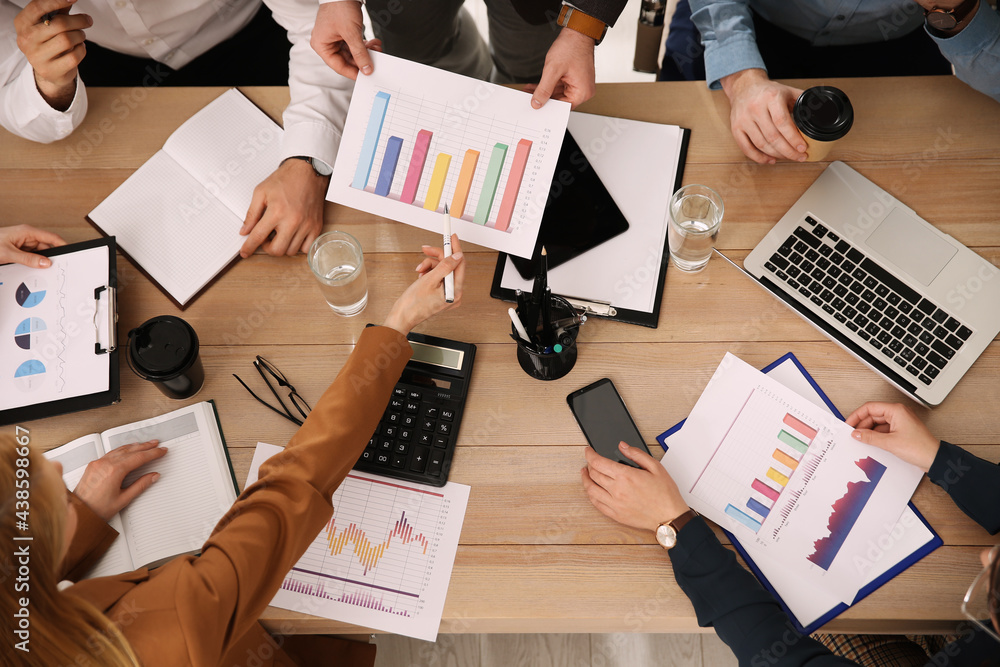 © New Africa - Businesspeople having meeting in office, top view. Management consulting