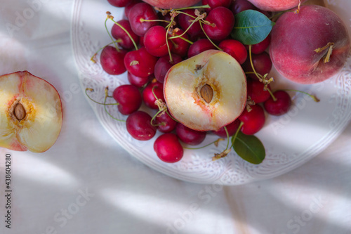 Wallpaper Mural Ripe peaches in basket on light background Torontodigital.ca