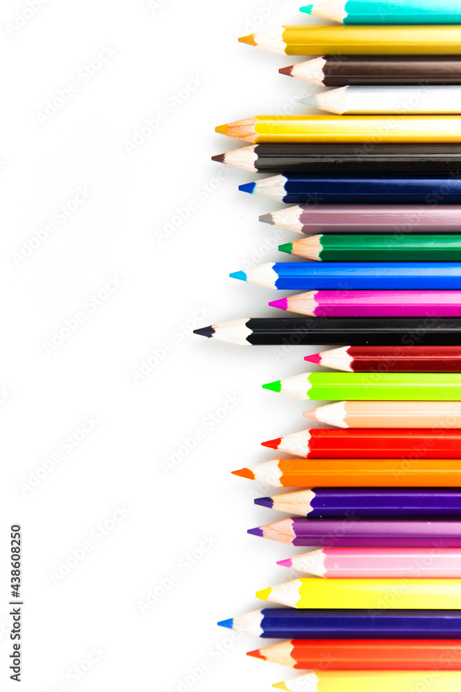 Coloured Pencils on White Paper Background Coloured Pencils on White Paper Background