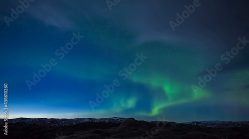 aurora borealis over the mountains