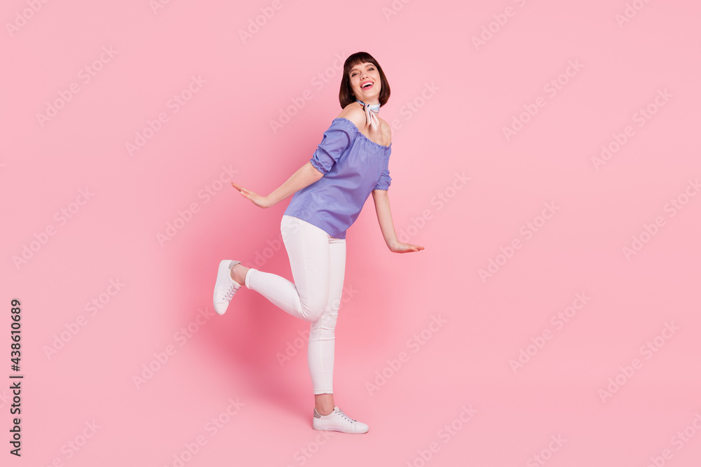 Full length body size photo woman laughing happy overjoyed in casual clothes isolated on pastel pink color background