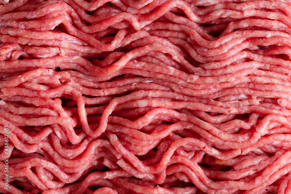 Minced meat with spices on table Minced meat with spices on table