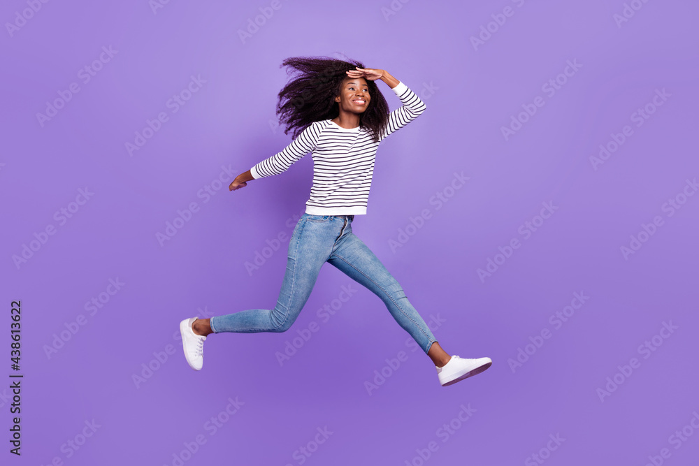 Full length body size view of pretty cheerful girl jumping running meet friend isolated over violet purple color background