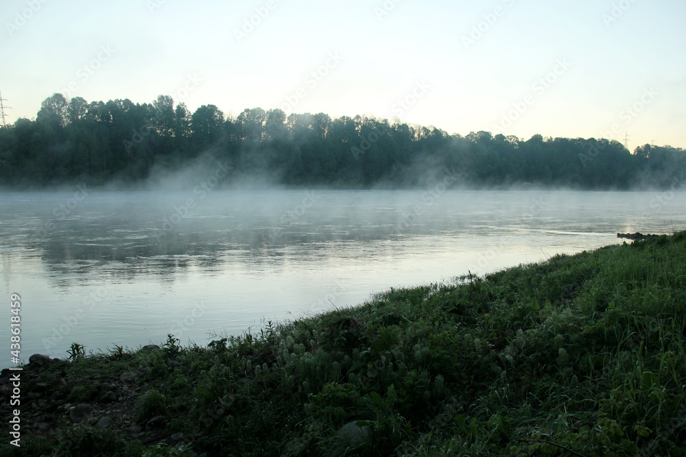 Fog on the river early in the morning during the summer Fog on the river early in the morning during the summer