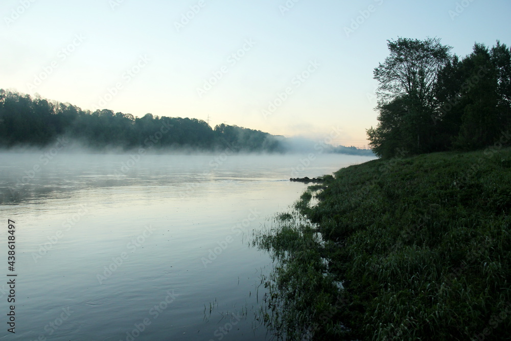 Fototapeta premium Fog on the river early in the morning during the summer