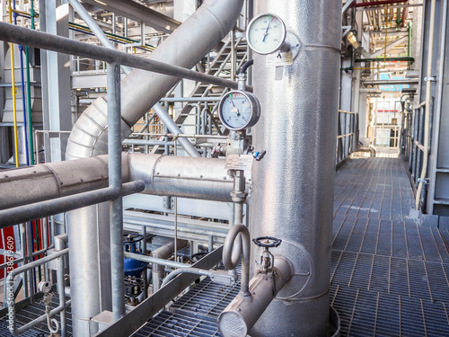 Pressure gauge of measuring instrument close up in industry zone at power plant.