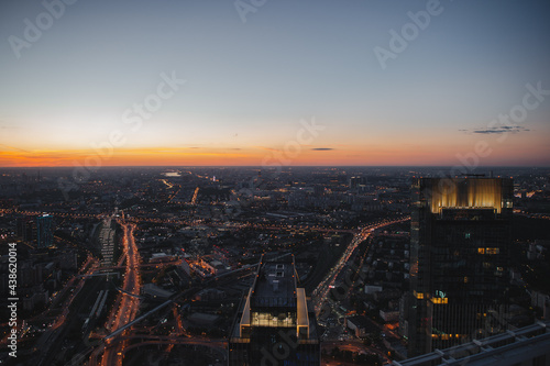 Aerial view of the Moscow city during sunset. View from the observation platform of the business center of Moscow City. Photography from a height of 354 meters.