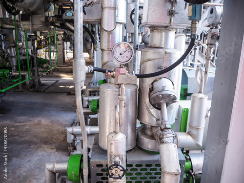 Pressure gauge of measuring instrument close up in industry zone at power plant.