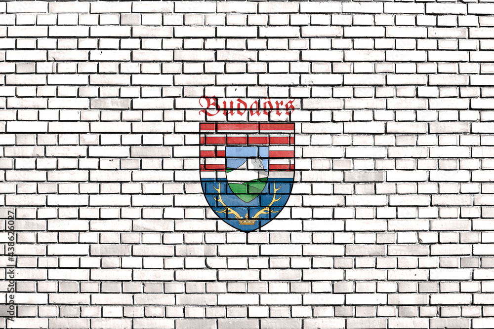 flag of Budaors painted on brick wall
