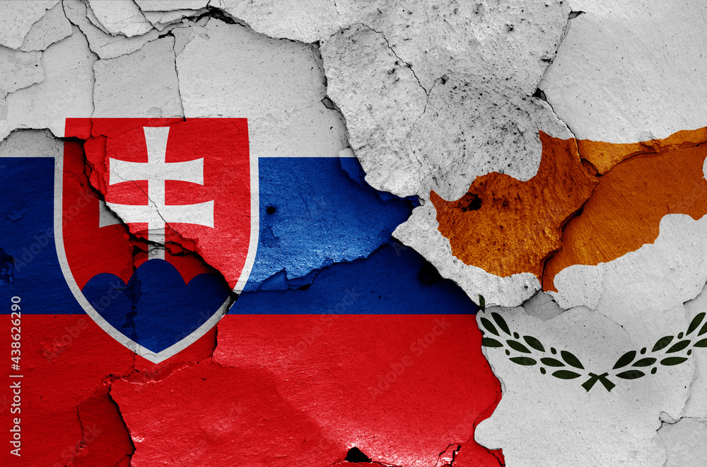flags of Slovakia and Cyprus painted on cracked wall flags of Slovakia and Cyprus painted on cracked wall