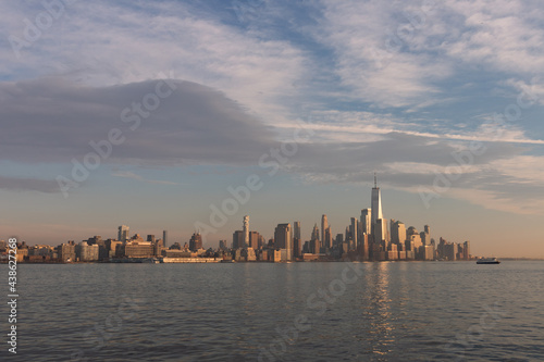 Wide Lower Manhattan Skyline along the Hudson River during a Warm Sunset in New York City