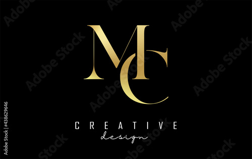 Golden MC m c letter design logo logotype concept with serif font and elegant style. Vector illustration icon with letters M and C. photo