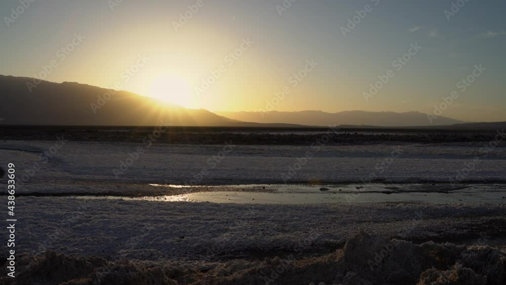 Handheld shot at sunset over a salt creek. Handheld shot at sunset over a salt creek.