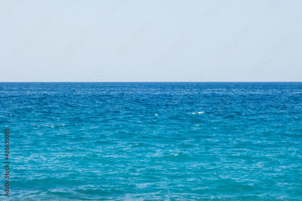 Bright blue sea on a windy and sunny day Bright blue sea on a windy and sunny day