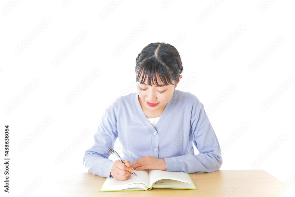 授業を受ける若い女子学生 授業を受ける若い女子学生