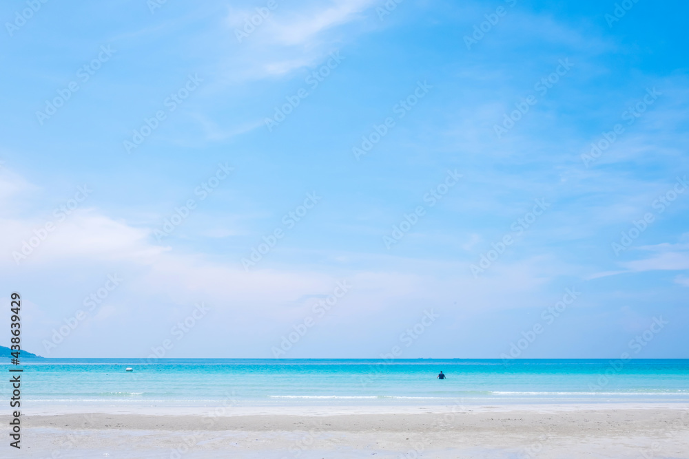 Sea and beautiful blue sky. Calm and relaxing empty beach scene.